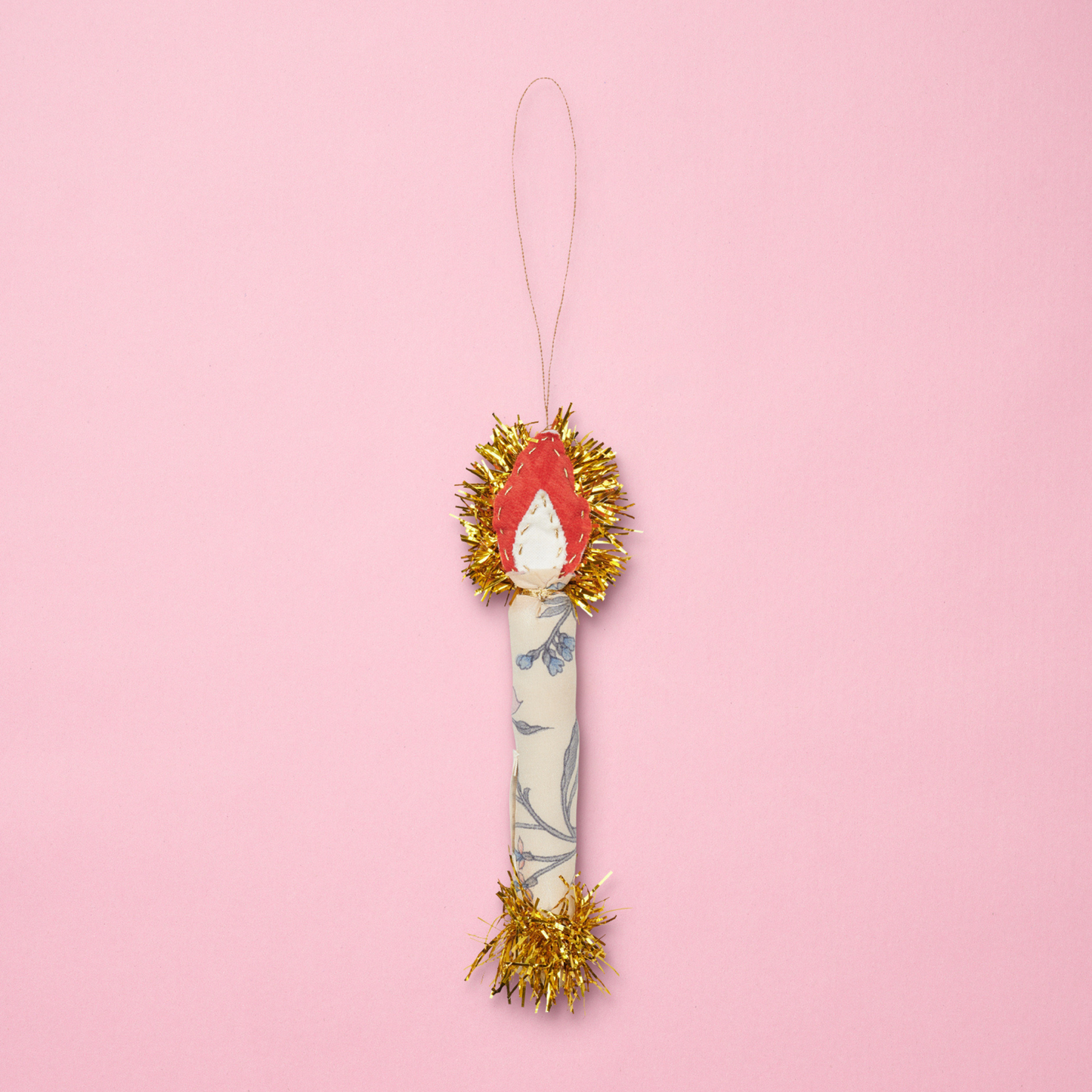 Tekstil julelys med stof af blå blomster og guld flamme